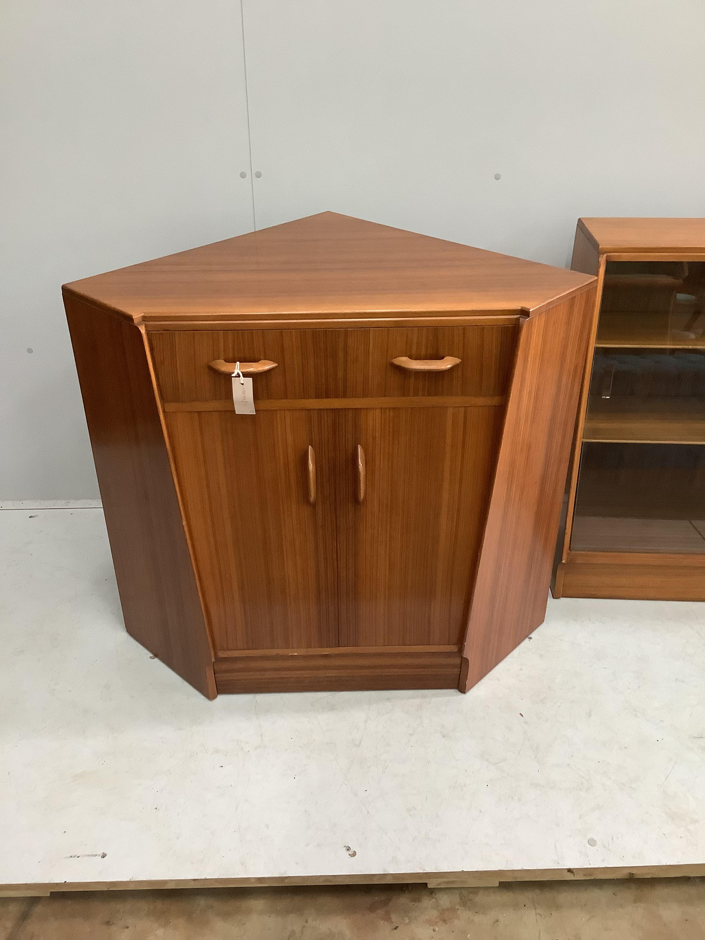 A mid century G-Plan teak corner bureau / combined bookcase, length 161cm, depth 70cm, height 85cm